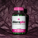 Chlorophix edible deodorizing capsules photographed on deep aubergine plum backdrop