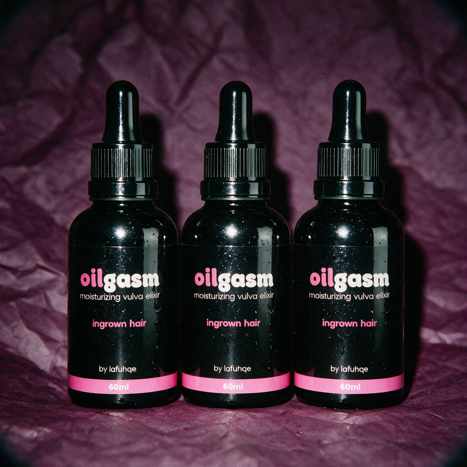 Oilgasm three pack on deep plum crumpled paper