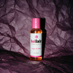 Helixir 1oz sample on deep plum crumpled paper
