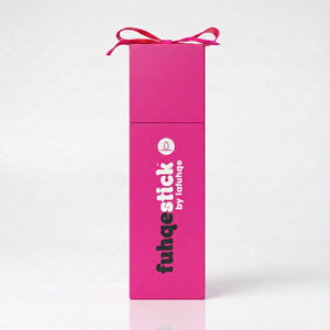 Pink packaging box with 'fuhqestick by lafuhqe' branding on a white background